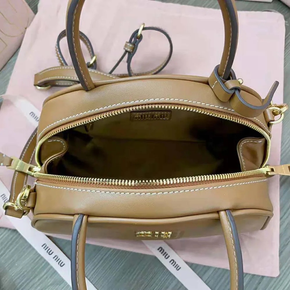 Miu Miu Medium Leather Top-handle Bag for Women in Brown