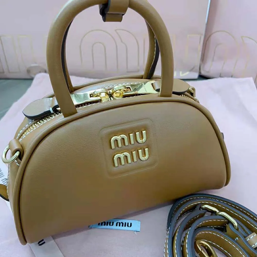 Miu Miu Mini Leather Top-handle Bag for Women in Brown