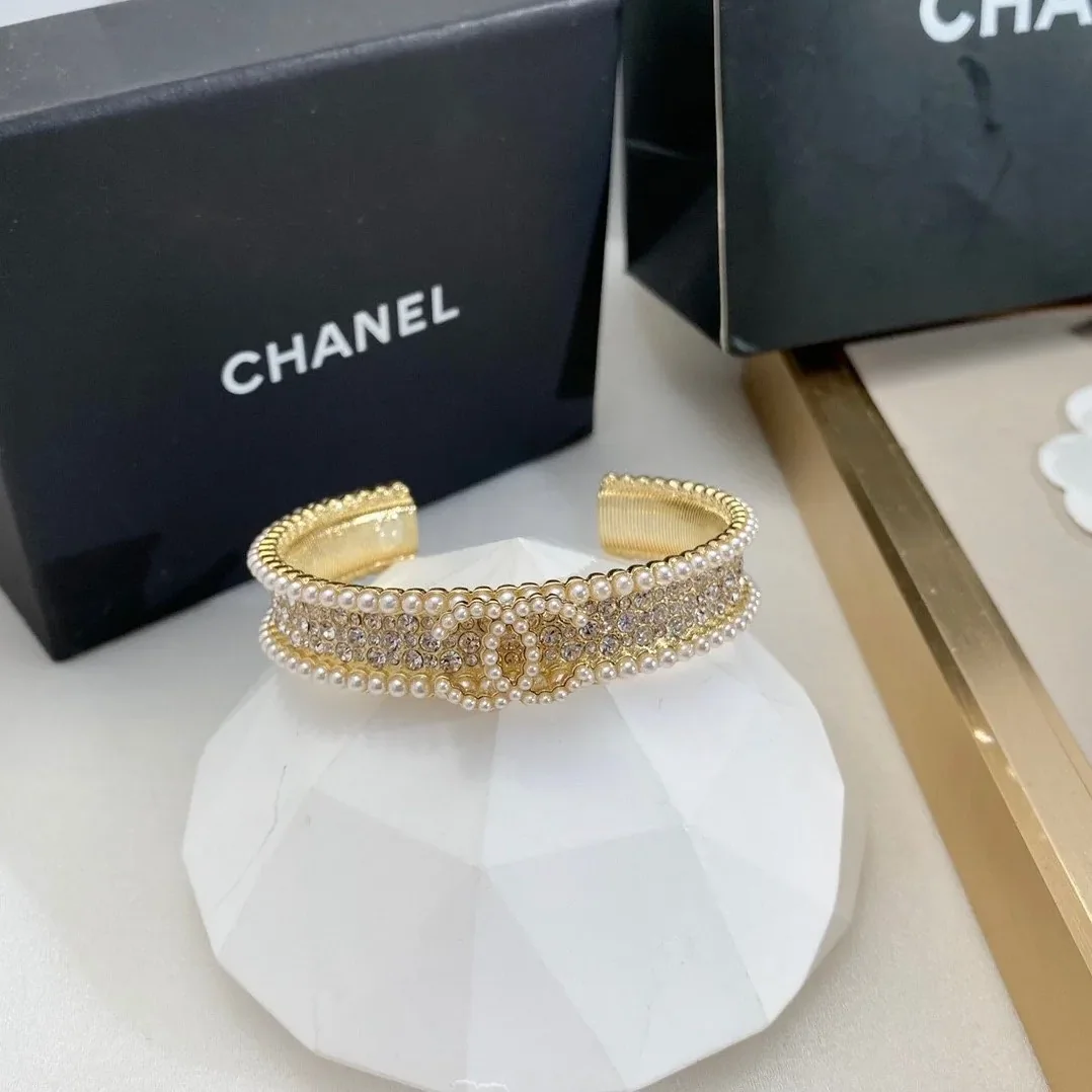 Chanel Pearl And Crystal Interlocking CC Cuff Bracelet Gold Hardware Chanel Pearl And Crystal Interlocking CC Cuff Bracelet Gold Hardware