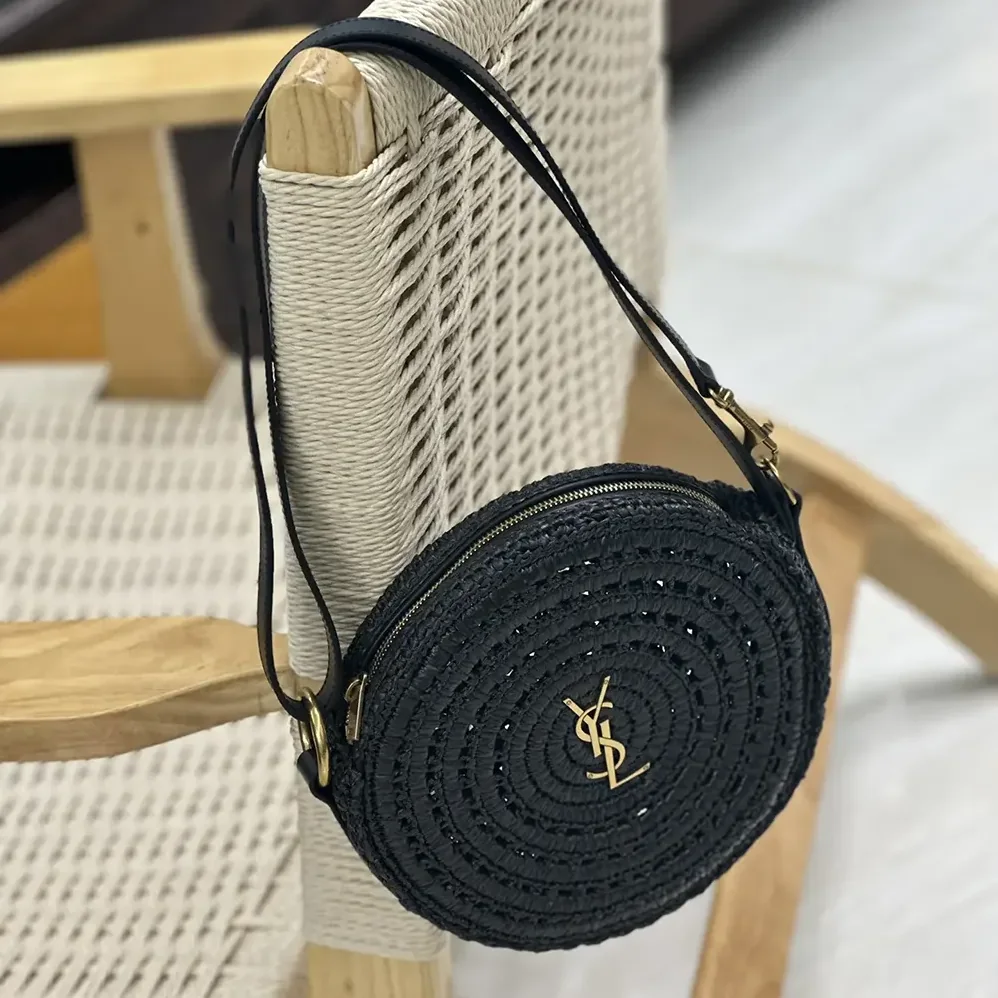 Saint Laurent YSL Round Bag in Raffia and Vegetable-Tanned Leather for Women in Black Saint Laurent YSL Round Bag in Raffia and Vegetable-Tanned Leather for Women in Black