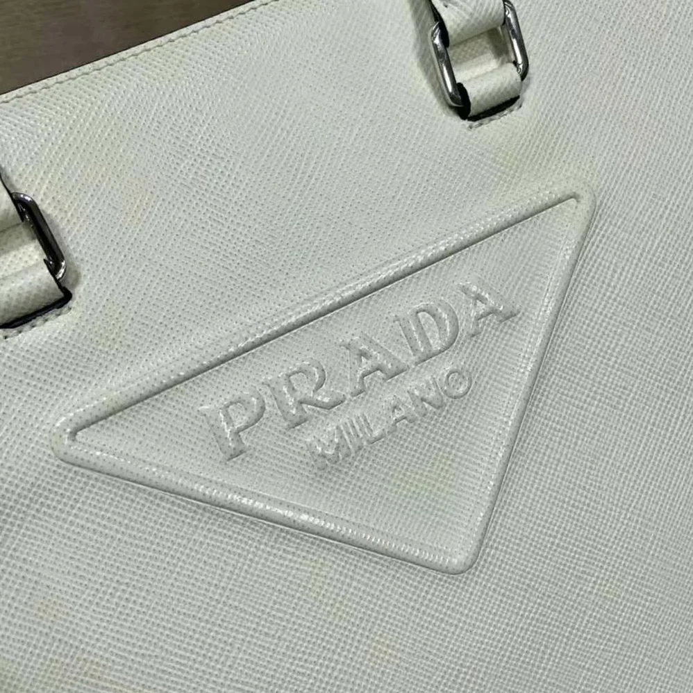 Prada Saffiano Leather Tote Bag with Sleek for Women in White Prada Saffiano Leather Tote Bag with Sleek for Women in White