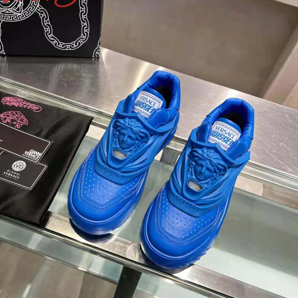 Versace Odissea Sneakers are Set on Rubber Soles with Perforated Toe Caps for Unisex in Blue Versace Odissea Sneakers are Set on Rubber Soles with Perforated Toe Caps for Unisex in Blue