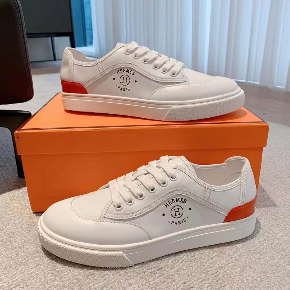 Hermes Get Sneaker in Calfskin with Signature “Hermès Paris” Stencil for Unisex in White Hermes Get Sneaker in Calfskin with Signature “Hermès Paris” Stencil for Unisex in White