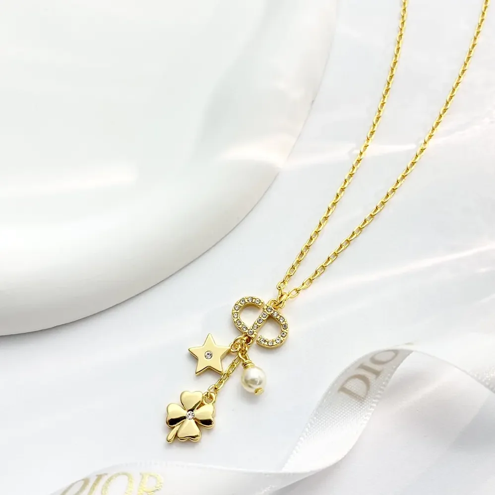 Dior Petit CD Lucky Charms Necklace Gold-Finish Metal with a White Resin Pearl and Silver for Women in Tone Crystals Dior Petit CD Lucky Charms Necklace Gold-Finish Metal with a White Resin Pearl and Silver for Women in Tone Crystals
