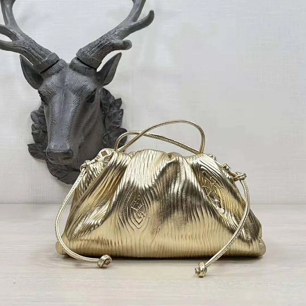 Bottega Veneta Pouch Metalized Leather Clutch for Women in Gold