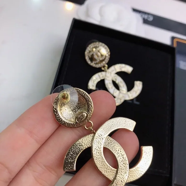 Chanel Engraved Pattern Douple C Earrings Gold Tone Chanel Engraved Pattern Douple C Earrings Gold Tone