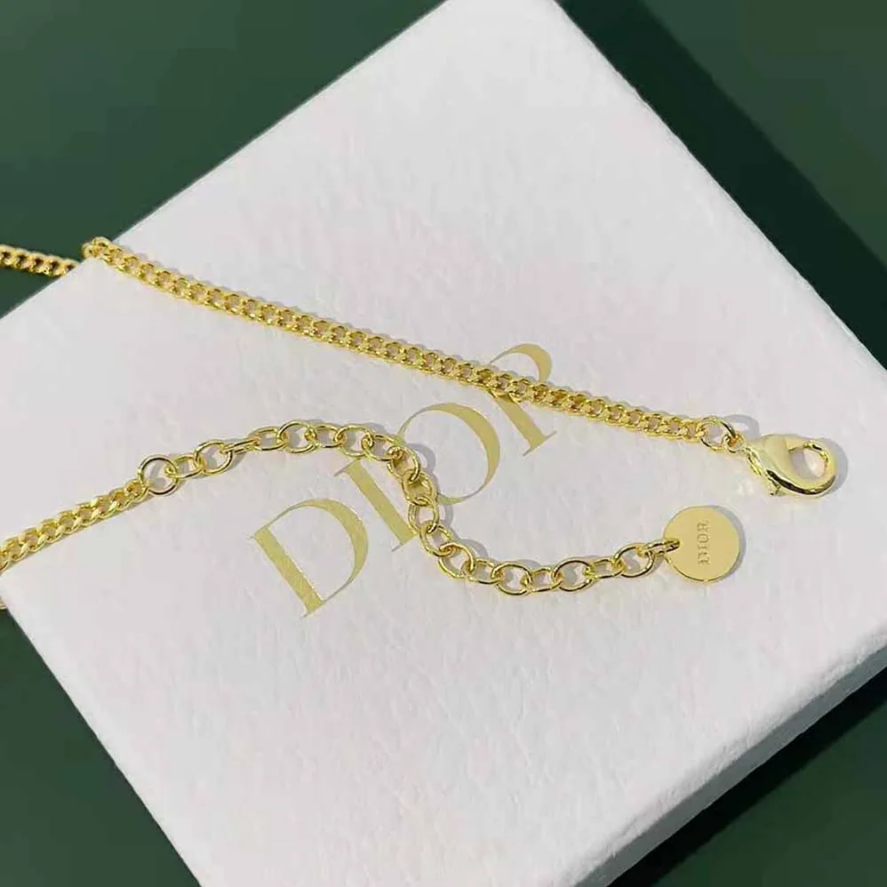 Dior Petit CD Necklace Gold-Finish Metal with a White Resin Pearl and White Crystals for Women Dior Petit CD Necklace Gold-Finish Metal with a White Resin Pearl and White Crystals for Women