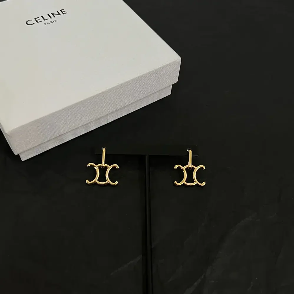 Celine Triomphe Lock Earrings in Brass with Gold Finish for Women in Gold Celine Triomphe Lock Earrings in Brass with Gold Finish for Women in Gold