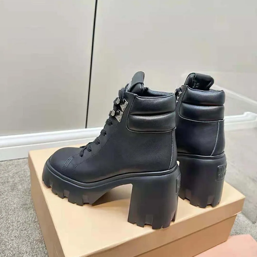 Miu Miu Leather Booties with EVA Sole with Logo for Women in Black Miu Miu Leather Booties with EVA Sole with Logo for Women in Black
