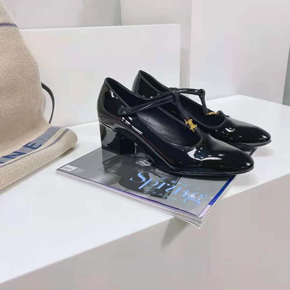 Celine Babies T-Bar Pump in Patent Calfskin and Grosgrain for Women in Black Celine Babies T-Bar Pump in Patent Calfskin and Grosgrain for Women in Black