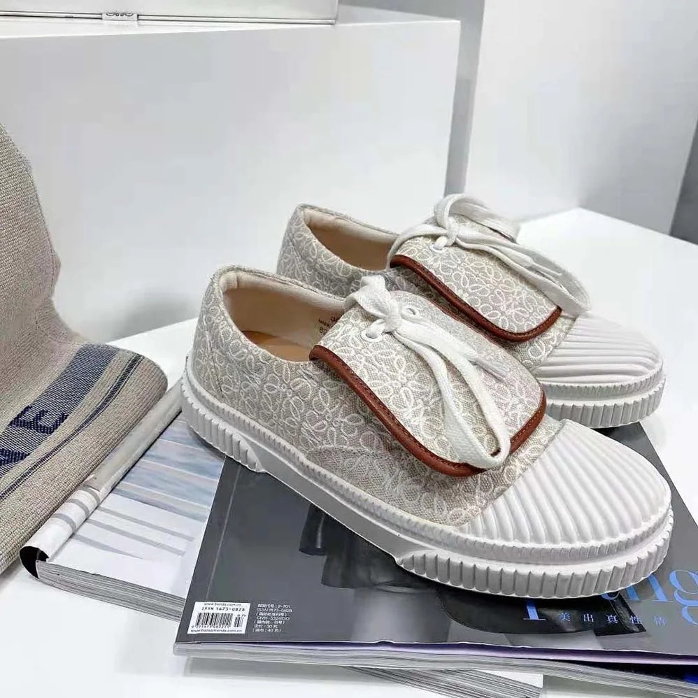 Loewe Anagram Flap Sneaker in Canvas for Women in White Loewe Anagram Flap Sneaker in Canvas for Women in White