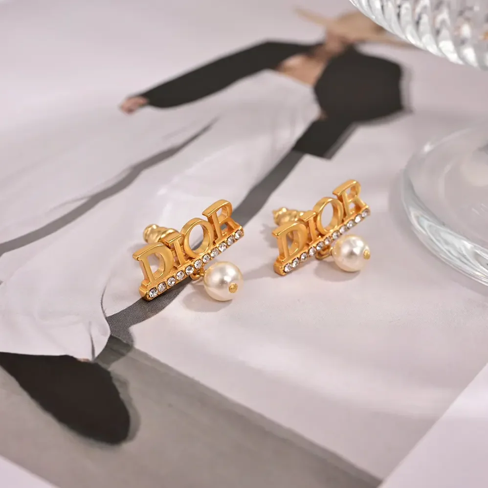 Dior Dio(r)evolution Earrings Gold-Finish Metal with White Resin Pearls and Silver for Women in Tone Crystals Dior Dio(r)evolution Earrings Gold-Finish Metal with White Resin Pearls and Silver for Women in Tone Crystals