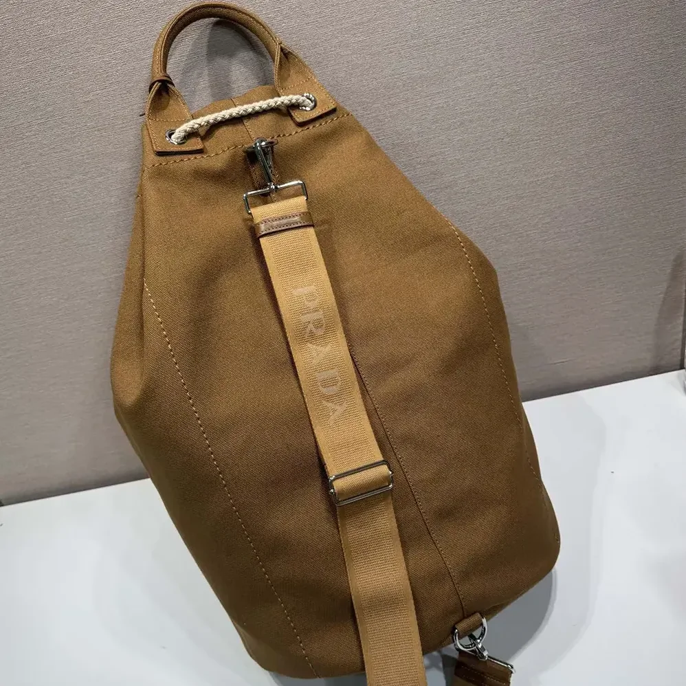Prada Canvas Drawstring Duffle Bag for Unisex in Brown