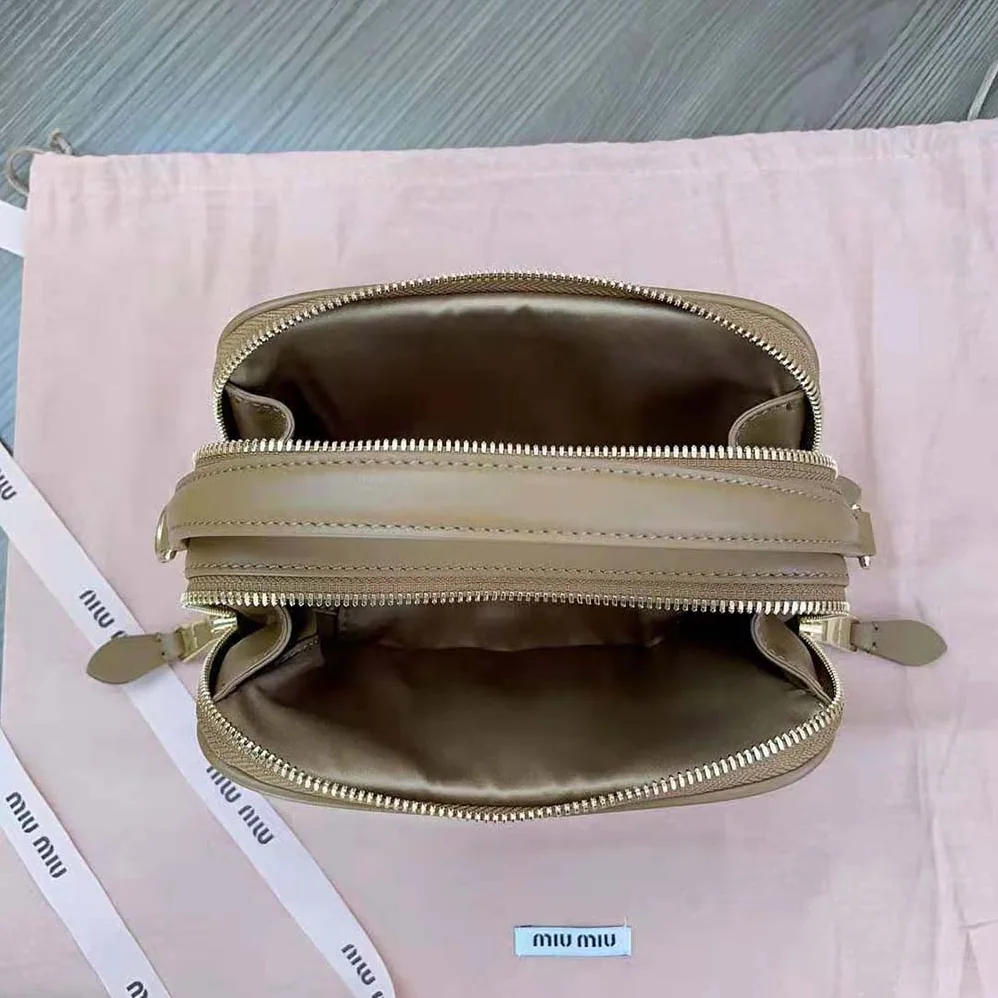 Miu Miu Arcadie Leather Bag with Metal Lettering Logo for Women in Brown Miu Miu Arcadie Leather Bag with Metal Lettering Logo for Women in Brown