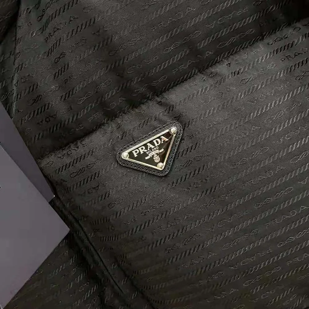 Prada Re-Nylon Hooded Down Jacket for Women in Black Prada Re-Nylon Hooded Down Jacket for Women in Black