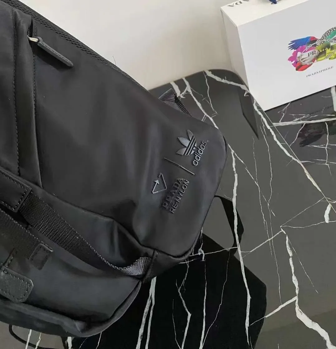 Prada Re-Nylon And Saffiano Backpack Black / 2VZ135_2DMG_F0002_V_HOL Prada Re-Nylon And Saffiano Backpack Black / 2VZ135_2DMG_F0002_V_HOL