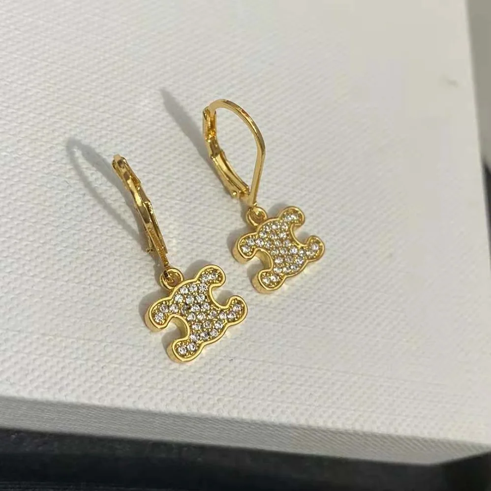 Celine Triomphe Rhinestone Earrings in Brass with Gold Finish and Crystals for Women Celine Triomphe Rhinestone Earrings in Brass with Gold Finish and Crystals for Women