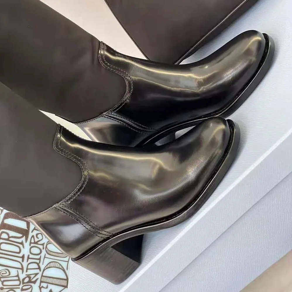 Prada Brushed Leather and Nylon Boots for Women in Black