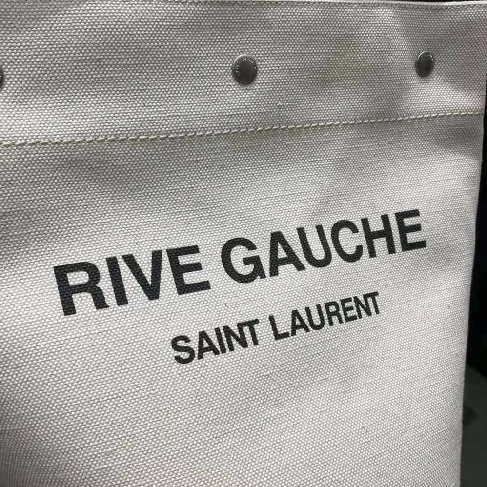 Saint Laurent YSL Rive Gauche Bucket Bag in Linen for Women in Black Saint Laurent YSL Rive Gauche Bucket Bag in Linen for Women in Black
