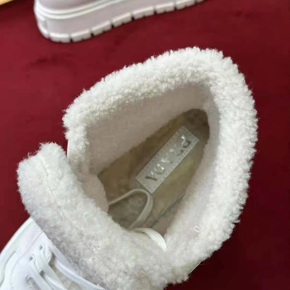Prada Leather and Shearling High-Top Sneakers for Women in White Prada Leather and Shearling High-Top Sneakers for Women in White