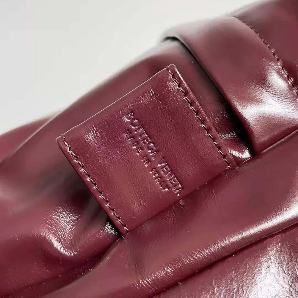 Bottega Veneta Medium Archetype Backpack Crafted from Supple Lambskin Leather for Men in Maroon
