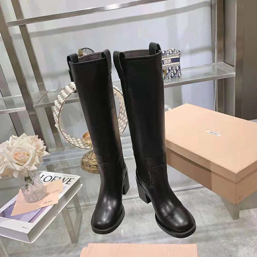 Miu Miu Leather Booties with Screen-printed Logo for Women in Black