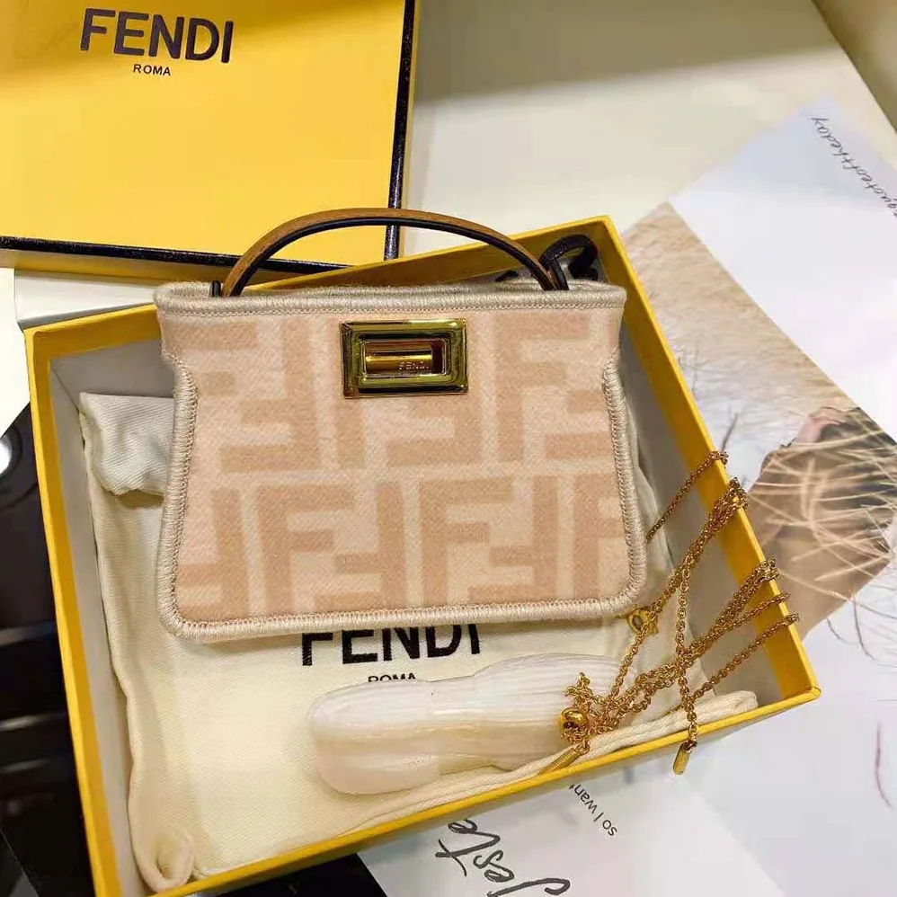Fendi Nano Peekaboo Charm Beige Wool Charm for Women in Pink Fendi Nano Peekaboo Charm Beige Wool Charm for Women in Pink
