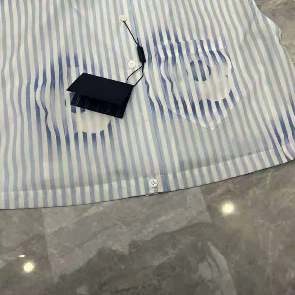 Prada Sleeveless Printed Poplin Shirt for Women in Blue Prada Sleeveless Printed Poplin Shirt for Women in Blue
