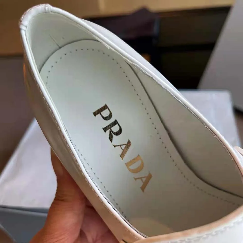 Prada Brushed Leather Loafers for Women in White Prada Brushed Leather Loafers for Women in White