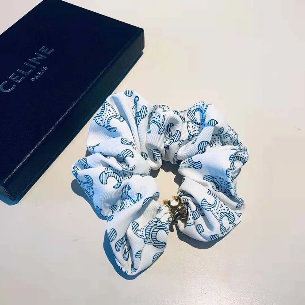 Celine Scrunchy Celine Triomphe Toile De Jouy Bracelet in Brass with Gold Finish and White and Navy Silk for Women Celine Scrunchy Celine Triomphe Toile De Jouy Bracelet in Brass with Gold Finish and White and Navy Silk for Women