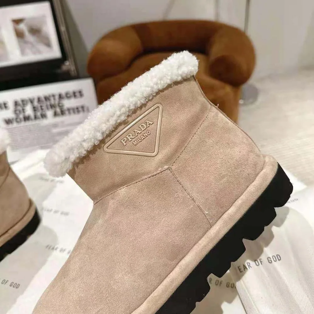 Prada Shearling Booties with Rubber Triangle Logo for Unisex Prada Shearling Booties with Rubber Triangle Logo for Unisex