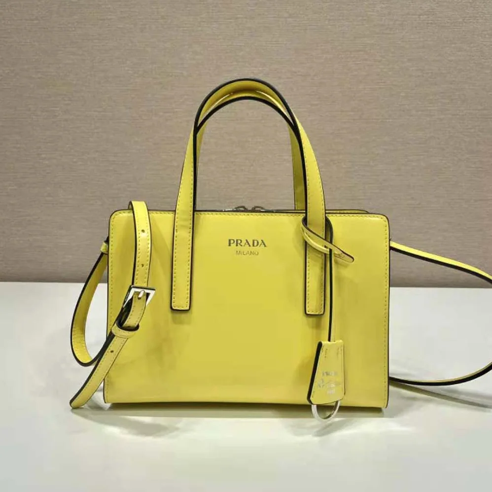Prada Re-Edition 1995 Brushed-Leather Mini Handbag for Women in Yellow Prada Re-Edition 1995 Brushed-Leather Mini Handbag for Women in Yellow