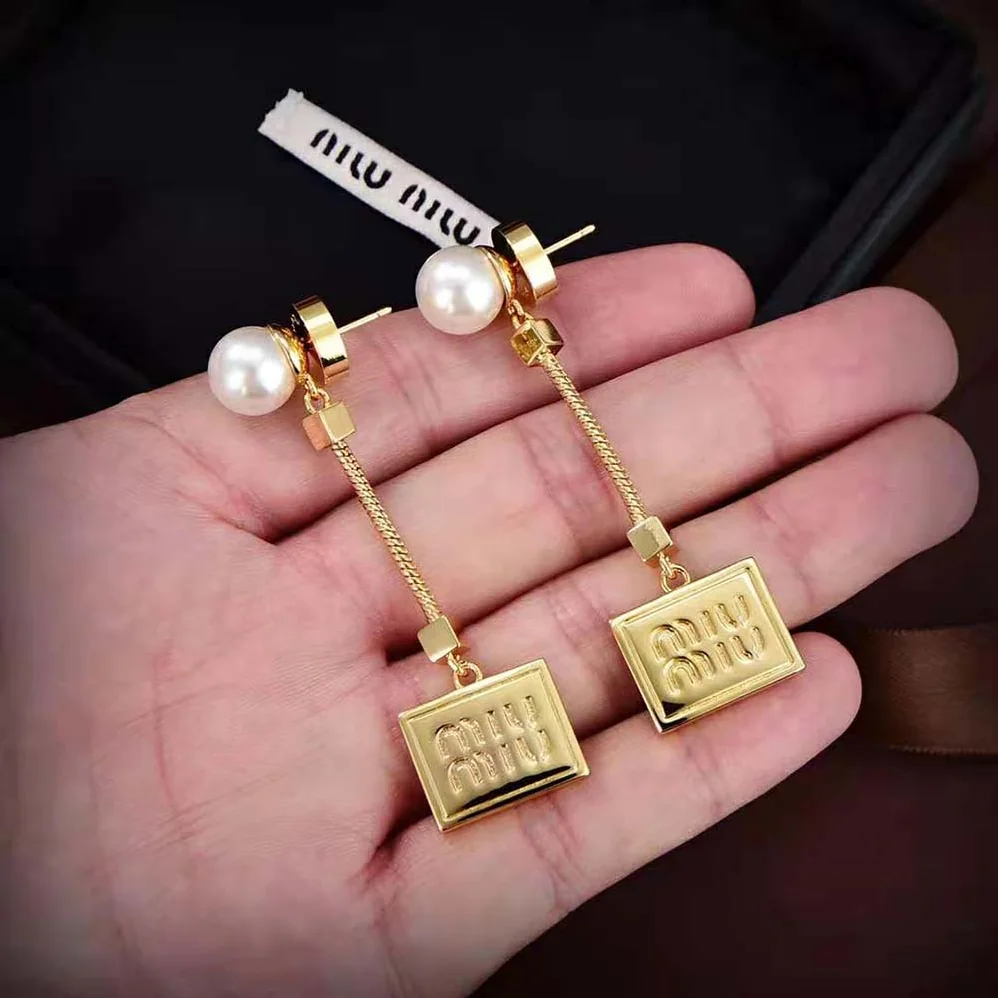 Miu Miu Metal Earrings with Artificial Pearls for Women Miu Miu Metal Earrings with Artificial Pearls for Women