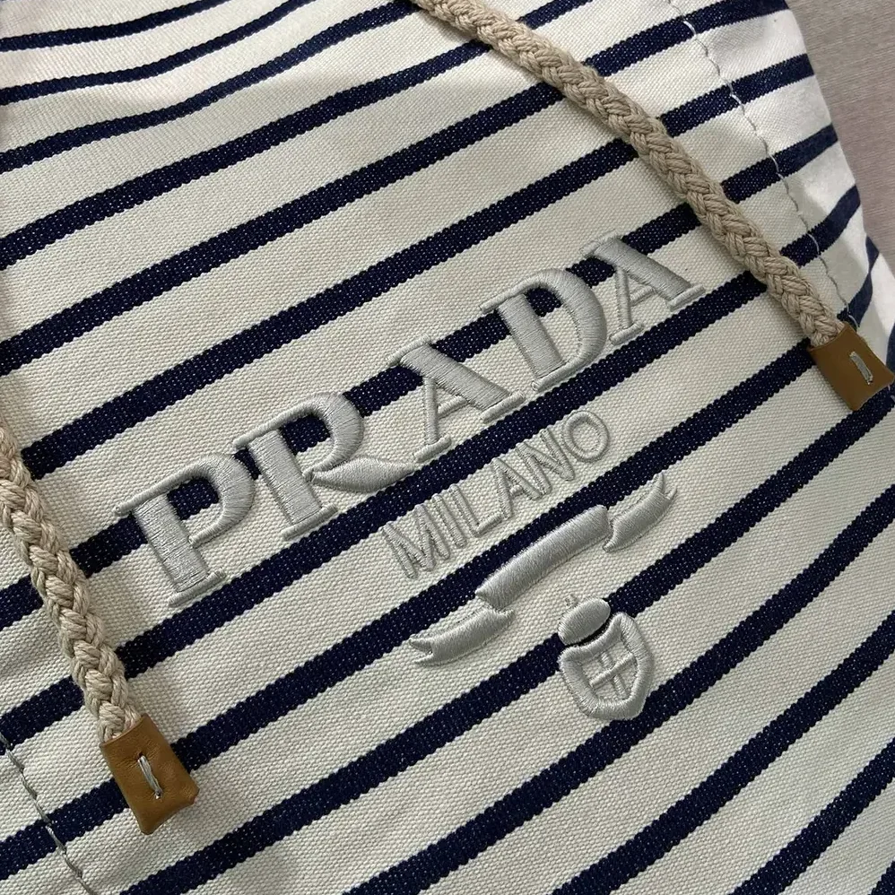 Prada Striped Canvas Drawstring Duffel Bag for Unisex in White