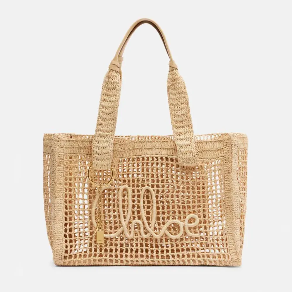 Chloe Summer Banana East-west Tote Bag in Raffia & Buffalo Leather for Women in Beige Chloe Summer Banana East-west Tote Bag in Raffia & Buffalo Leather for Women in Beige