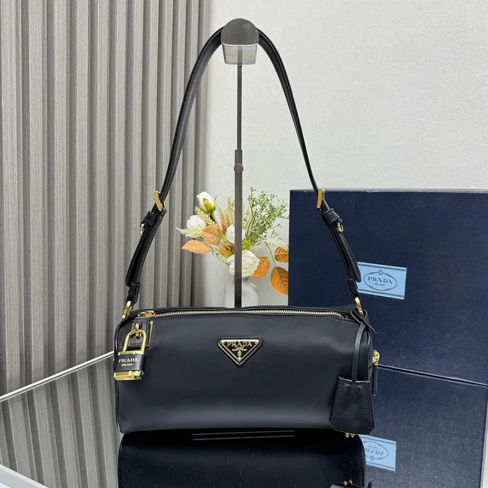 Prada Medium Re-Nylon and Leather Shoulder Bag with Padlock for Women Prada Medium Re-Nylon and Leather Shoulder Bag with Padlock for Women