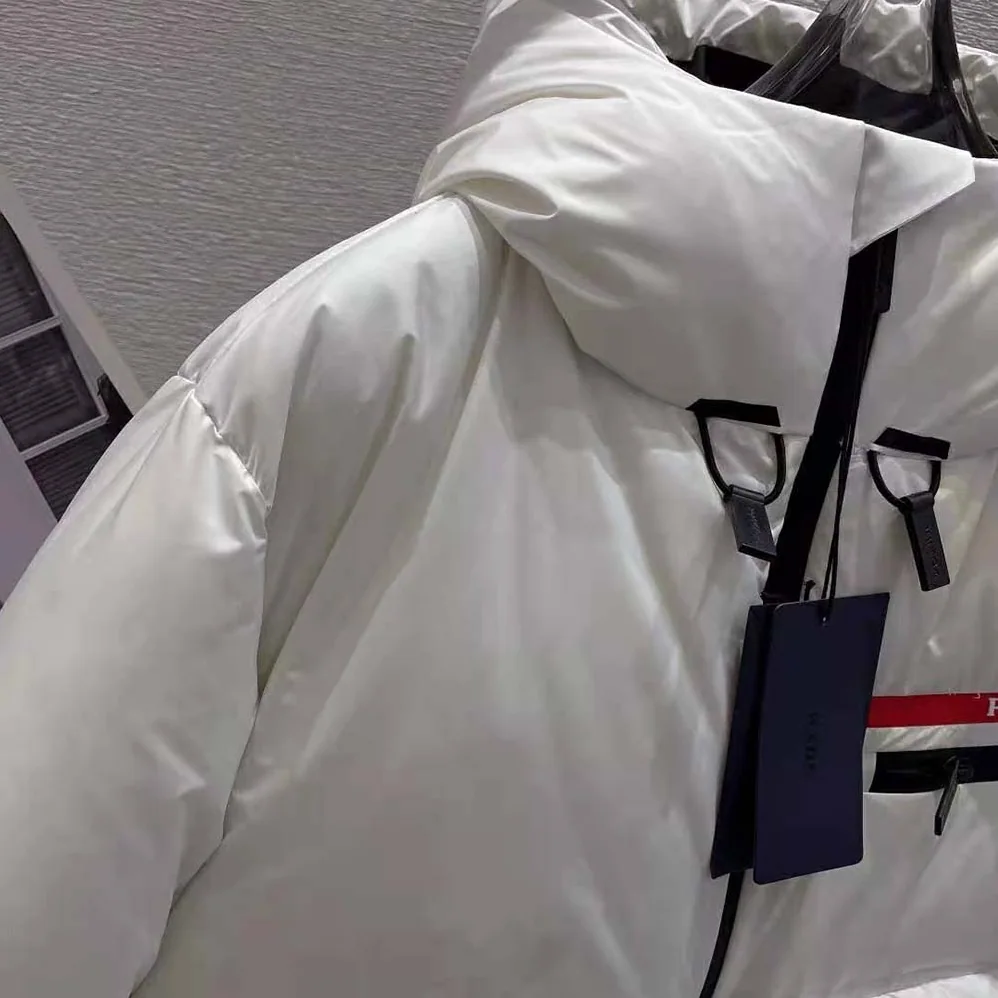 Prada Light Polyester Puffer Jacket for Women in White Prada Light Polyester Puffer Jacket for Women in White