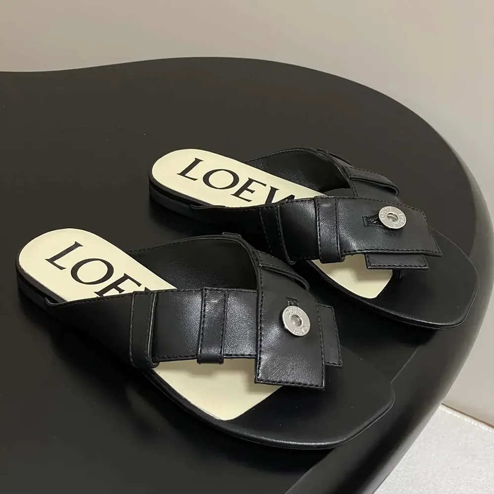 Loewe Toy Panta Toe Post Sandal in Lambskin for Women in Black Loewe Toy Panta Toe Post Sandal in Lambskin for Women in Black