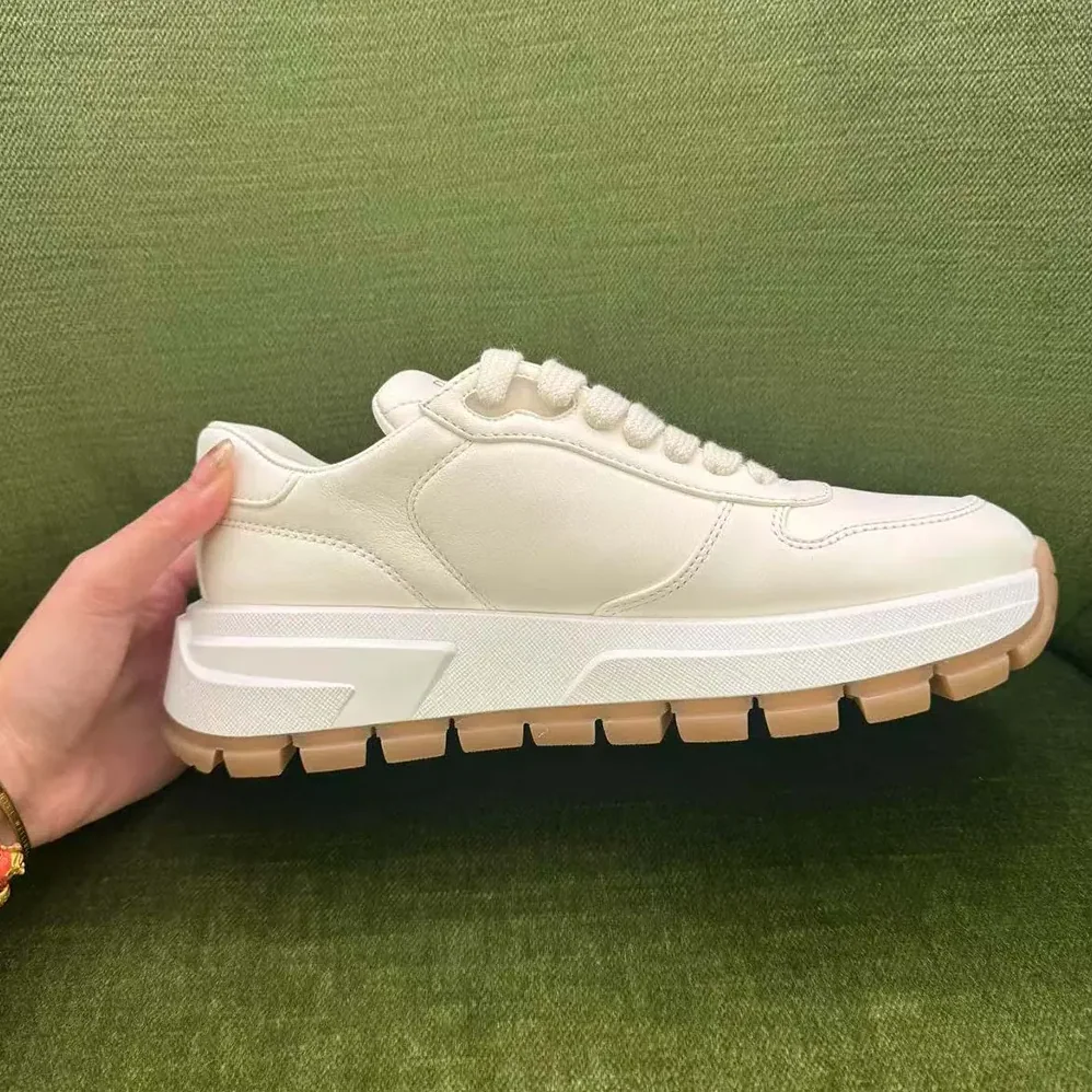 Prada Triangle Logo Leather Sneakers for Unisex in White