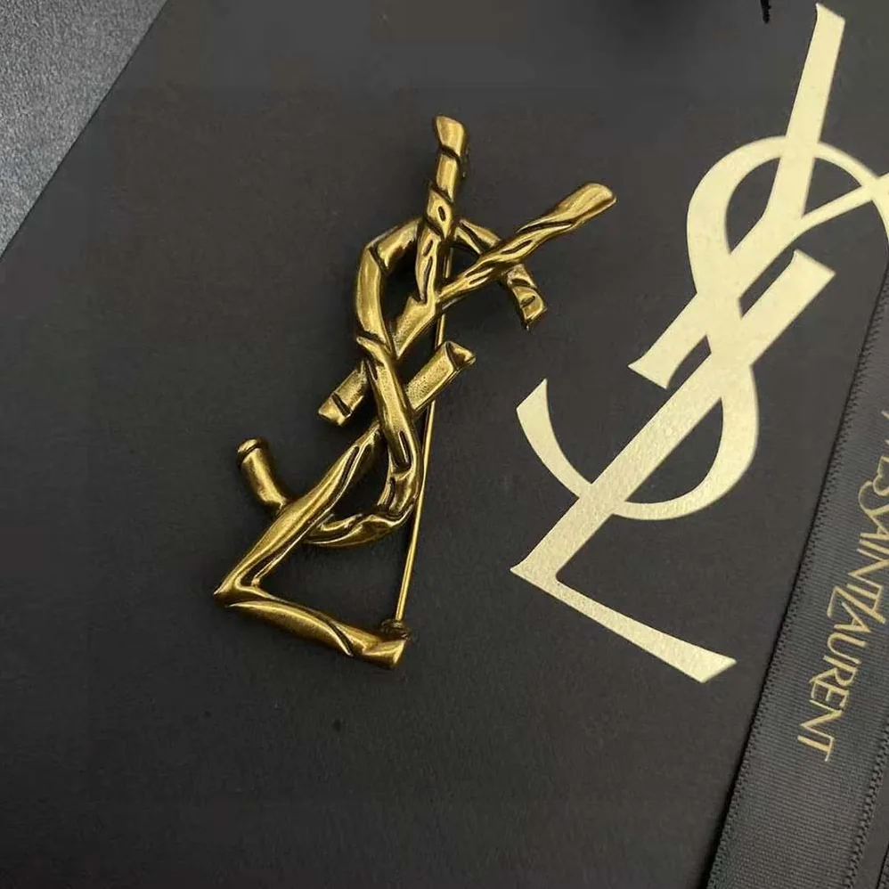 Saint Laurent YSL Opyum YSL Crocodile Brooch in Gold Brass for Women Saint Laurent YSL Opyum YSL Crocodile Brooch in Gold Brass for Women