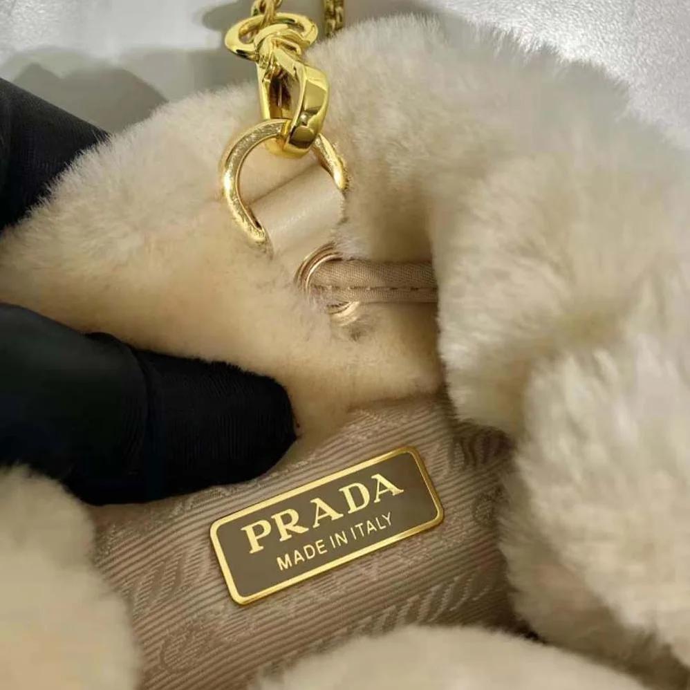 Prada Shearling Mini-pouch for Women in Beige