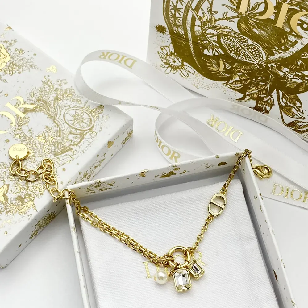Dior Petit CD Bracelet Gold-Finish Metal with a White Resin Pearl and Silver for Women in Tone Crystals Dior Petit CD Bracelet Gold-Finish Metal with a White Resin Pearl and Silver for Women in Tone Crystals
