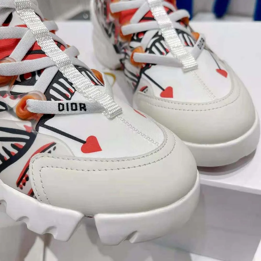 Dior D-Connect Sneaker White Technical Fabric with Red and Black Cupidon Print for Women Dior D-Connect Sneaker White Technical Fabric with Red and Black Cupidon Print for Women