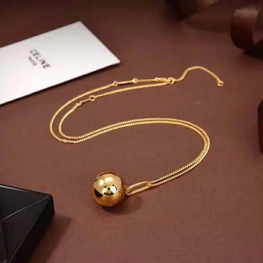 Celine Separables Boule Celine Paris Pendant in Brass with Gold Finish for Women