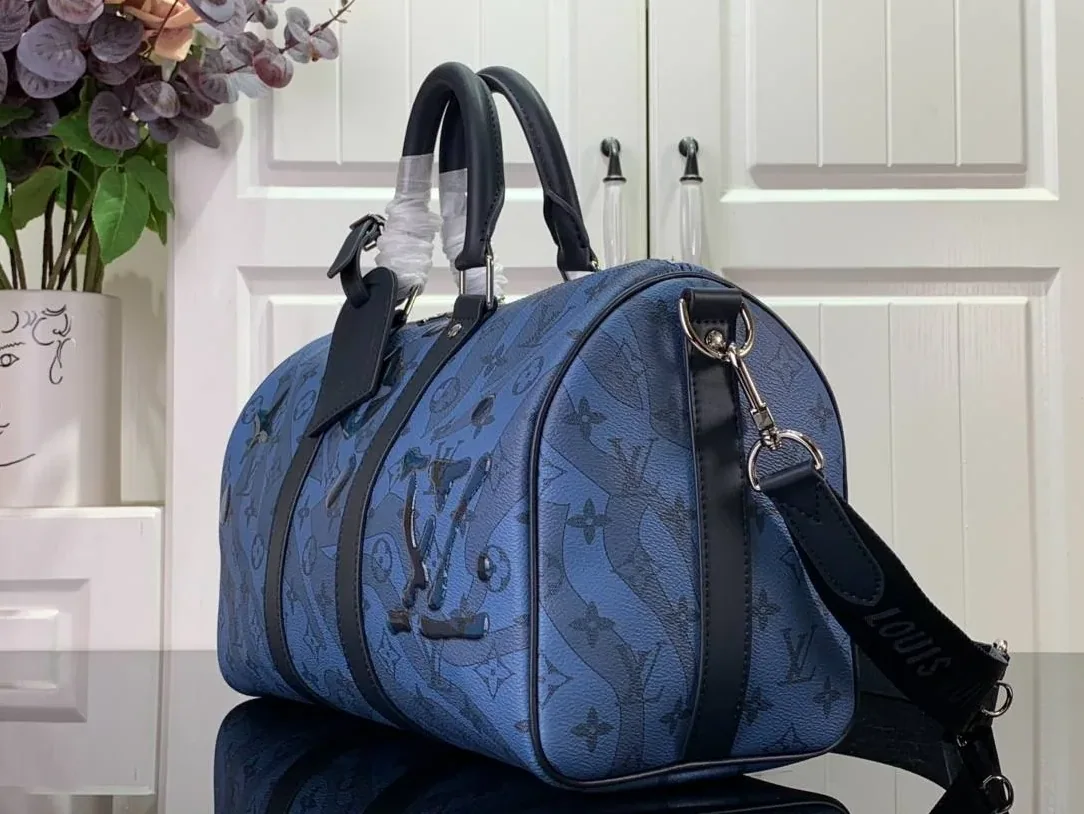 Louis Vuitton Keepall Bandouliere 35 Travel Bag in Blue Silver Hardware