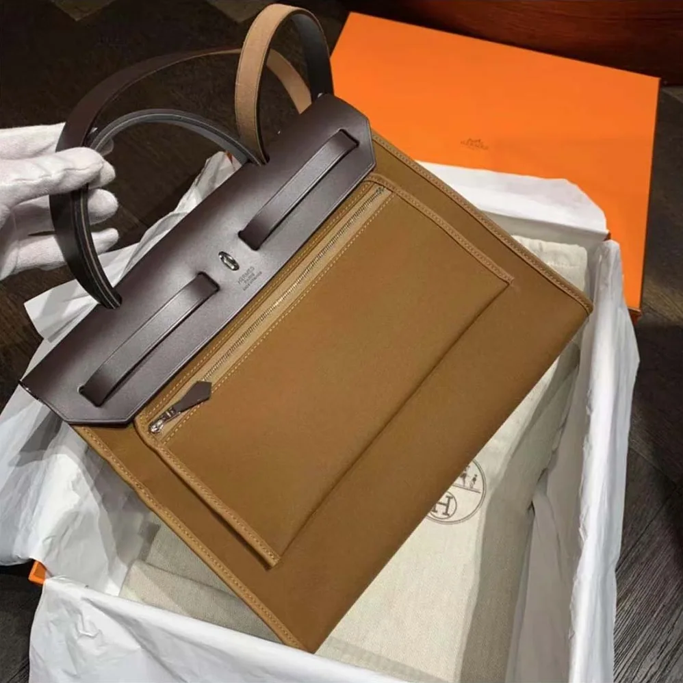 Hermes Herbag Zip 31 Bag for Women in Brown/Black Hermes Herbag Zip 31 Bag for Women in Brown/Black
