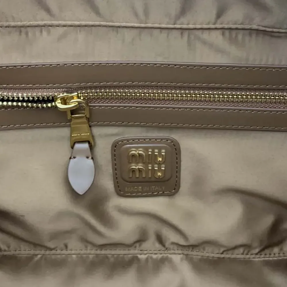 Miu Miu Beau Leather Top-handle Bag for Women in Brown