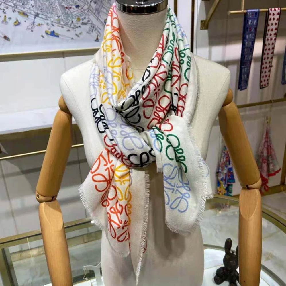 Loewe Anagram Lines Scarf in Wool and Cashmere for Women in White Loewe Anagram Lines Scarf in Wool and Cashmere for Women in White