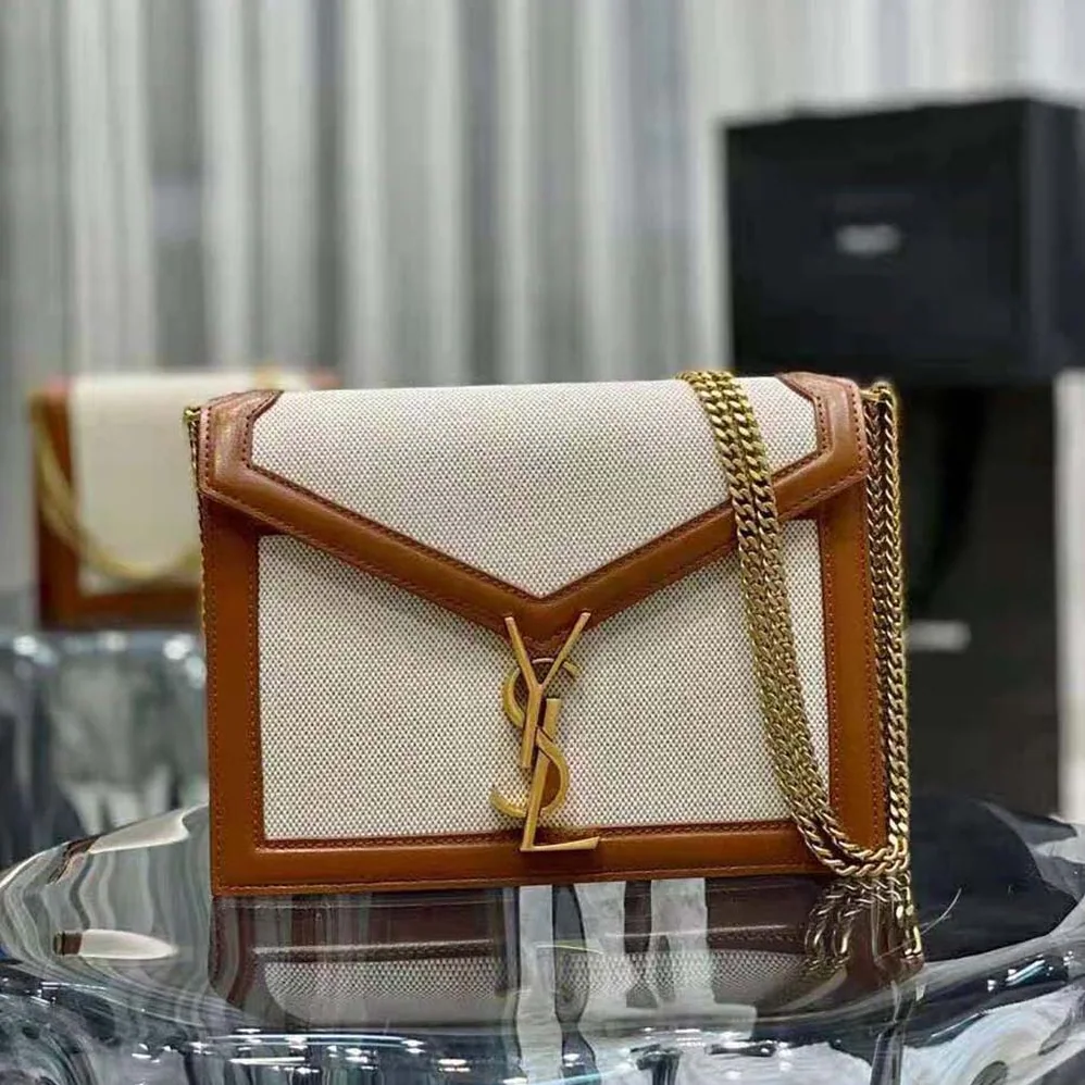 Saint Laurent YSL Cassandra Monogram Clasp Bag in Canvas and Smooth Leather for Women