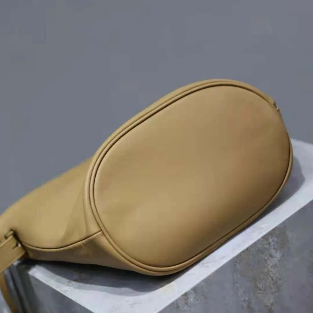 Saint Laurent YSL Rive Gauche Laced Bucket Bag in Smooth Leather for Men in Brown